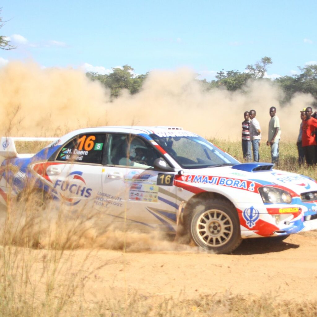 FUCHS TITAN Rally Team car sponsored by FUCHS Lubricants Tanzania making a sharp turn during an off-road rally in Tanzania